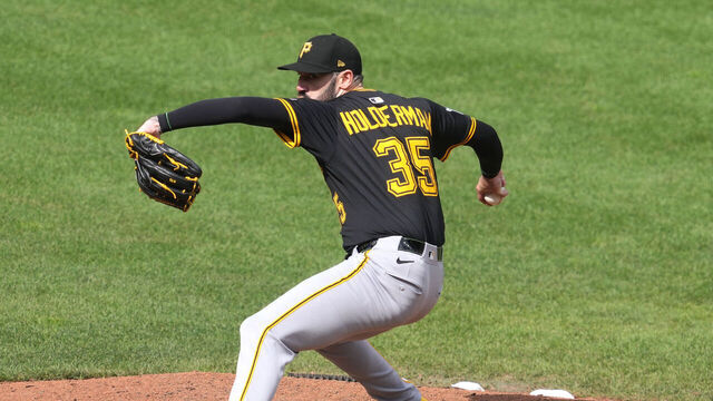 BALTIMORE, MD - SEPTEMBER 11: Colin Holderman #35 of the Pittsburgh Pirates pitches during a baseball game against the Baltimore Orioles at Oriole Park at Camden Yards on September 11, 2025 in Baltimore, Maryland.