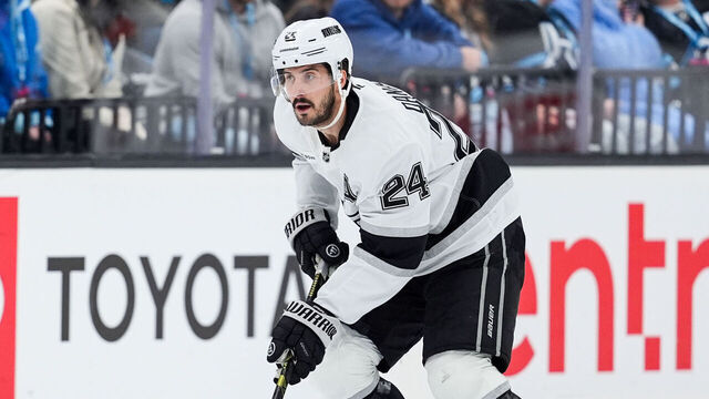 SALT LAKE CITY, UTAH - DECEMBER 8: Phillip Danault #24 of the Los Angeles Kings skates with the puck during the second period against the Utah Mammoth at Delta Center on December 8, 2025 in Salt Lake City, Utah.