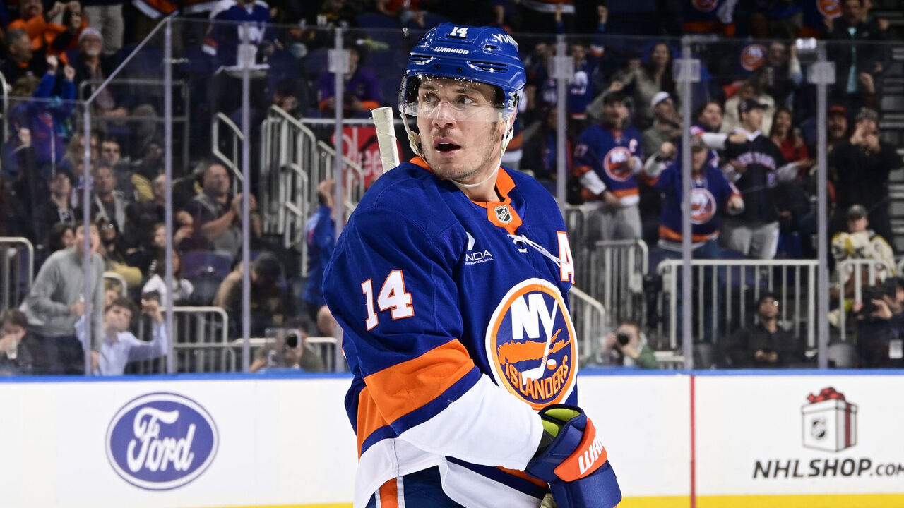 ELMONT, NEW YORK - DECEMBER 09: Bo Horvat #14 of the New York Islanders celebrates his third-period goal at 10:15 against the Vegas Golden Knights at UBS Arena on December 09, 2025 in Elmont, New York.