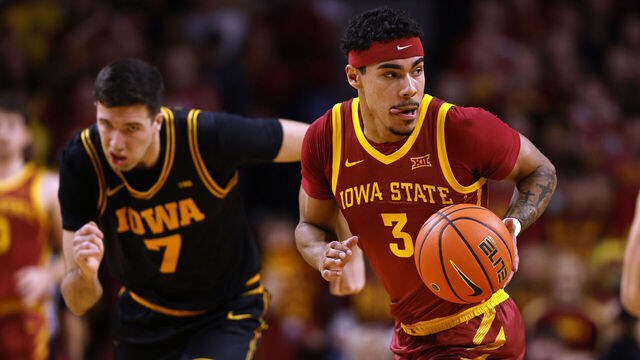 AMES, IA - DECEMBER 11: Guard Tamin Lipsey #3 of the Iowa State Cyclones steals the ball away from forward Alvaro Folgueiras #7 of the Iowa Hawkeyes in the first half of play at Hilton Coliseum on December 11, 2025, in Ames, Iowa.