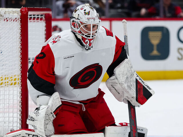 WASHINGTON, DC - DECEMBER 11: Brandon Bussi #32 of the Carolina Hurricanes tends net against the Washington Capitals during the second period of the game at Capital One Arena on December 11, 2025 in Washington, DC.