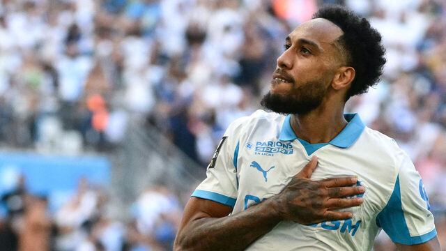 Marseille's Gabonese forward #97 Pierre-Emerick Aubameyang celebrates scoring his team's third goal during the French L1 football match between Olympique de Marseille (OM) and Paris FC at Stade Velodrome in Marseille, southern France on August 23, 2025.