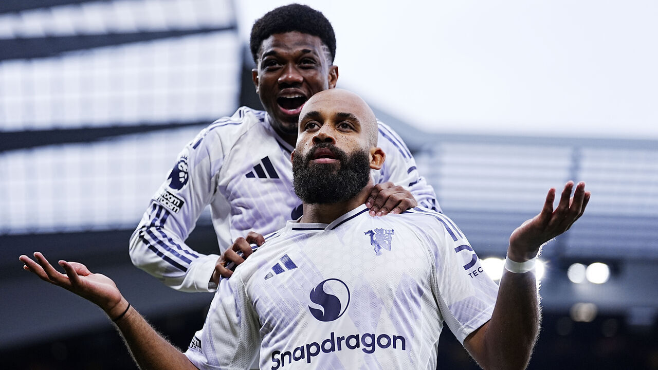 Manchester United's Bryan Mbeumo celebrates scoring their side's first goal with Amad Diallo during the Premier League match at Anfield, Liverpool. Picture date: Sunday October 19, 2025.