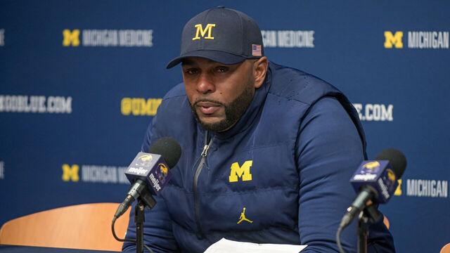 ANN ARBOR, MICHIGAN - NOVEMBER 29: Head Football Coach Sherrone Moore of the Michigan Wolverines speaks to media during the post game press conference after a college football game against the Ohio State Buckeyes at Michigan Stadium on November 29, 2025 in Ann Arbor, Michigan. The Ohio State Buckeyes won the game 27-9.
