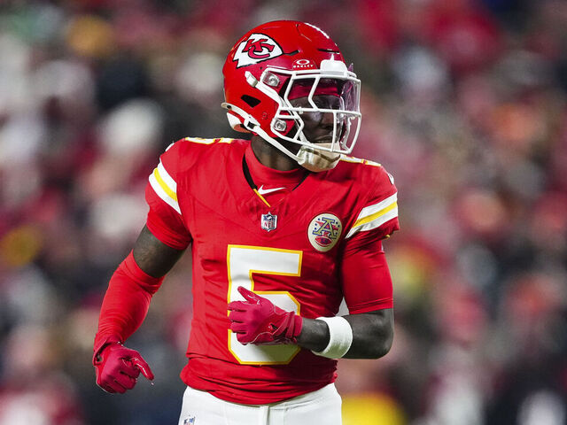 KANSAS CITY, MISSOURI - DECEMBER 07: Hollywood Brown #5 of the Kansas City Chiefs looks on from the field during an NFL football game against the Houston Texans at GEHA Field at Arrowhead Stadium on December 7, 2025 in Kansas City, Missouri.