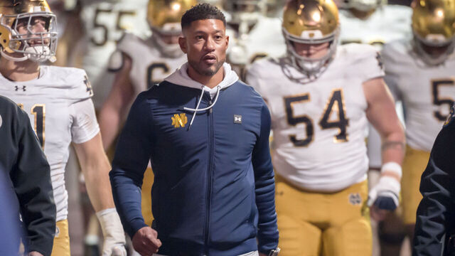 PALO ALTO, CA - NOVEMBER 29: Head Coach Marcus Freeman of the Notre Dame Fighting Irish leads his team into the stadium to start the second half of a college football game against the Stanford Cardinal on November 29, 2025 at Stanford Stadium in Palo Alto, California.