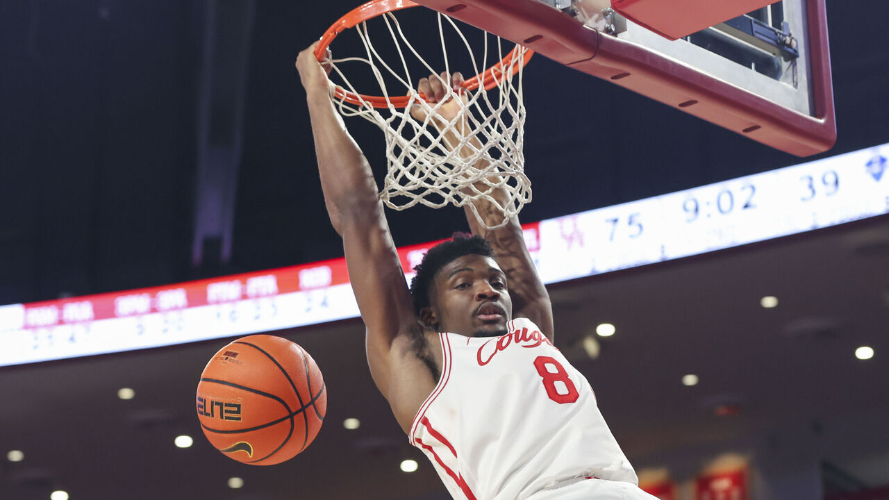 HOUSTON, TX - DECEMBER 13: Houston Cougars center Cedric Lath (8) dunks the ball in the second half during the college basketball game between the New Orleans Privateers and Houston Cougars on December 13, 2025 at Fertitta Center in Houston, Texas.