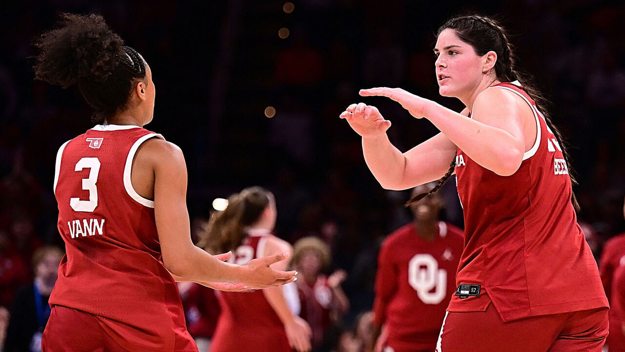 OKLAHOMA CITY, OKLAHOMA - DECEMBER 13: Zya Vann #3, Raegan Beers #15, and Aaliyah Chavez #2 of the Oklahoma Sooners celebrate during the first half against the Oklahoma State Cowgirls at Paycom Center on December 13, 2025 in Oklahoma City, Oklahoma.