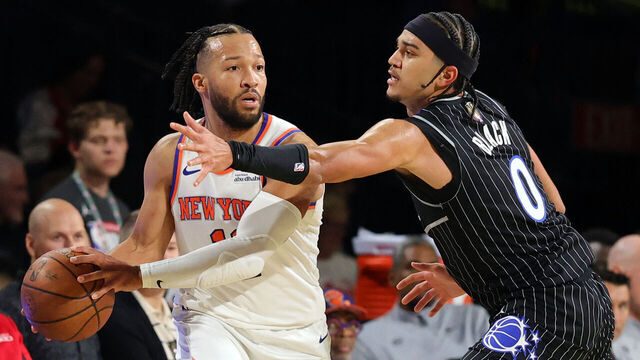 LAS VEGAS, NEVADA - DECEMBER 13: Jalen Brunson #11 of the New York Knicks is guarded by Anthony Black #0 of the Orlando Magic in the first quarter of a semifinal game of the Emirates NBA Cup at T-Mobile Arena on December 13, 2025 in Las Vegas, Nevada.