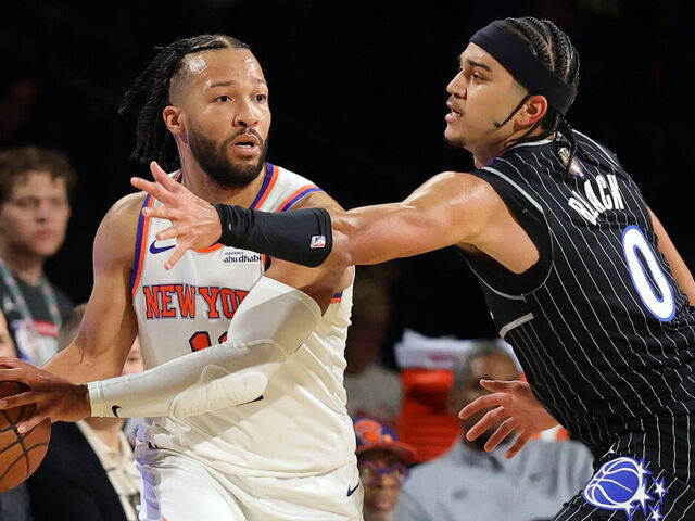 LAS VEGAS, NEVADA - DECEMBER 13: Jalen Brunson #11 of the New York Knicks is guarded by Anthony Black #0 of the Orlando Magic in the first quarter of a semifinal game of the Emirates NBA Cup at T-Mobile Arena on December 13, 2025 in Las Vegas, Nevada.
