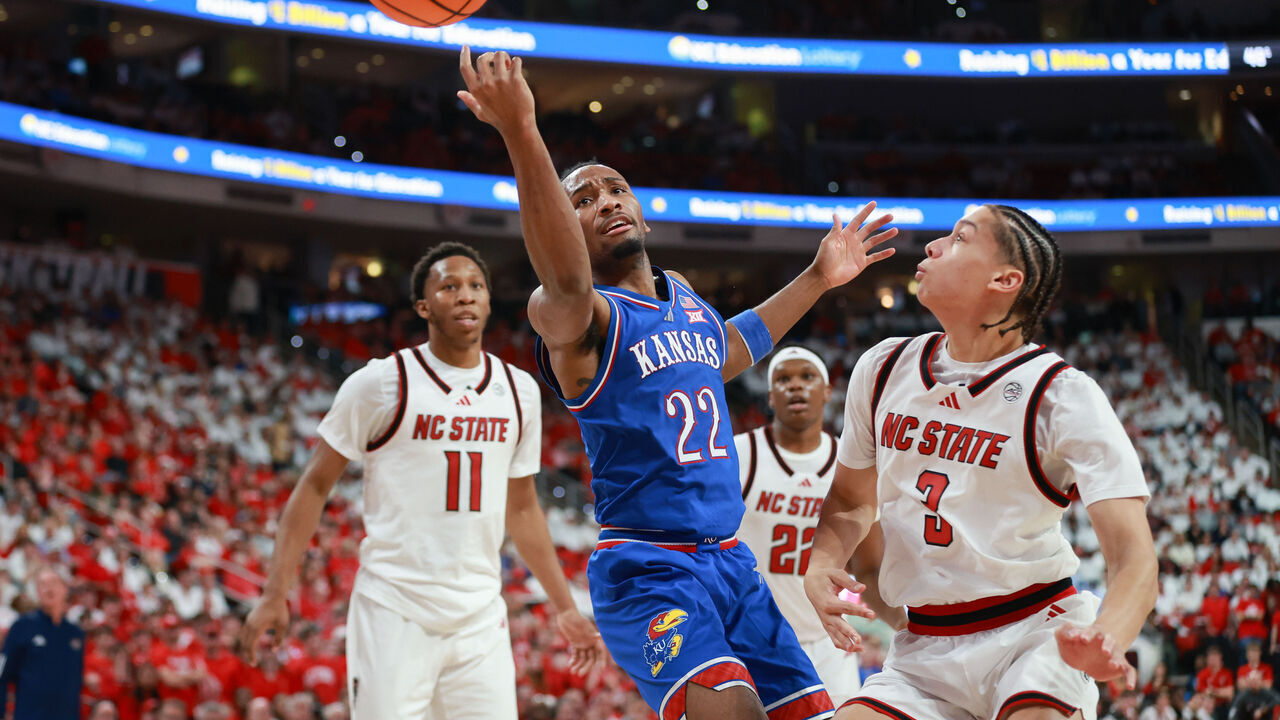 RALEIGH, NC - DECEMBER 13: Darryn Peterson #22 of the Kansas Jayhawks loses the ball during the college basketball game between the North Carolina State Wolfpack an the Kansas Jayhawks on December 13, 2025 at the Lenovo Center in Raleigh, NC.