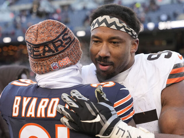 CHICAGO, ILLINOIS - DECEMBER 14: Kevin Byard III #31 of the Chicago Bears and Myles Garrett #95 of the Cleveland Browns meet after the game on December 14, 2025 in Chicago, Illinois.