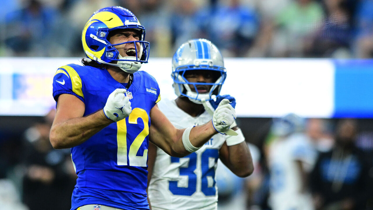 INGLEWOOD, CALIFORNIA - DECEMBER 14: Puka Nacua #12 of the Los Angeles Rams celebrates after a catch during the third quarter against the Detroit Lions at SoFi Stadium on December 14, 2025 in Inglewood, California.