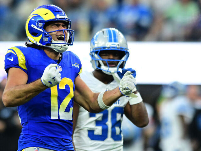 INGLEWOOD, CALIFORNIA - DECEMBER 14: Puka Nacua #12 of the Los Angeles Rams celebrates after a catch during the third quarter against the Detroit Lions at SoFi Stadium on December 14, 2025 in Inglewood, California.