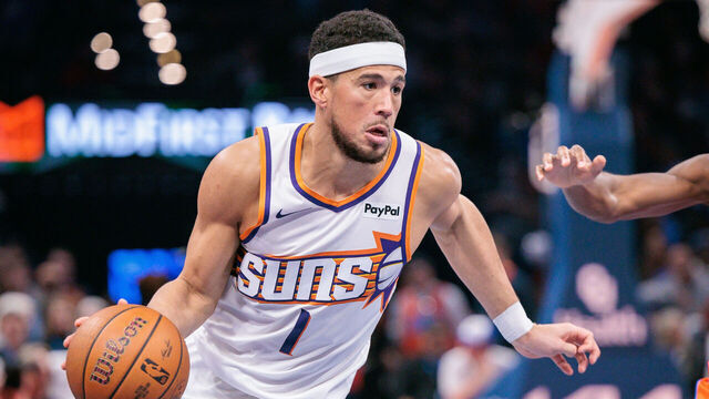 OKLAHOMA CITY, OKLAHOMA - NOVEMBER 28: Devin Booker #1 of the Phoenix Suns drives to the basket during the second half against the Oklahoma City Thunder at Paycom Center on November 28, 2025 in Oklahoma City, Oklahoma.