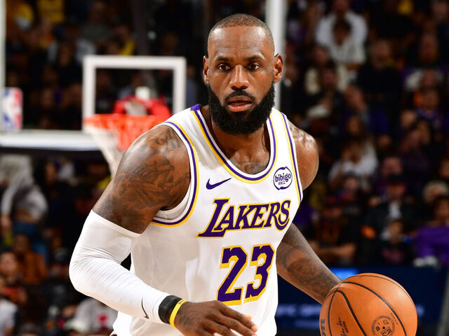 PHOENIX, AZ - DECEMBER 14: LeBron James #23 of the Los Angeles Lakers dribbles the ball during the game against the Phoenix Suns on December 14, 2025 at Footprint Center in Phoenix, Arizona. Mandatory Copyright Notice: Copyright 2025 NBAE