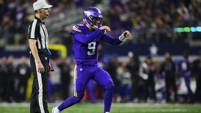 ARLINGTON, TX - DECEMBER 14: J.J. McCarthy #9 of the Minnesota Vikings reacts after a play against the Dallas Cowboys during the first half of an NFL football game at AT&T Stadium on December 14, 2025 in Arlington, Texas.
