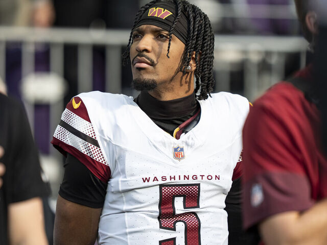 MINNEAPOLIS, MINNESOTA - DECEMBER 7: Jayden Daniels #5 of the Washington Commanders looks on during an NFL football game against the Minnesota Vikings at U.S. Bank Stadium on December 07, 2025 in Minneapolis, Minnesota.