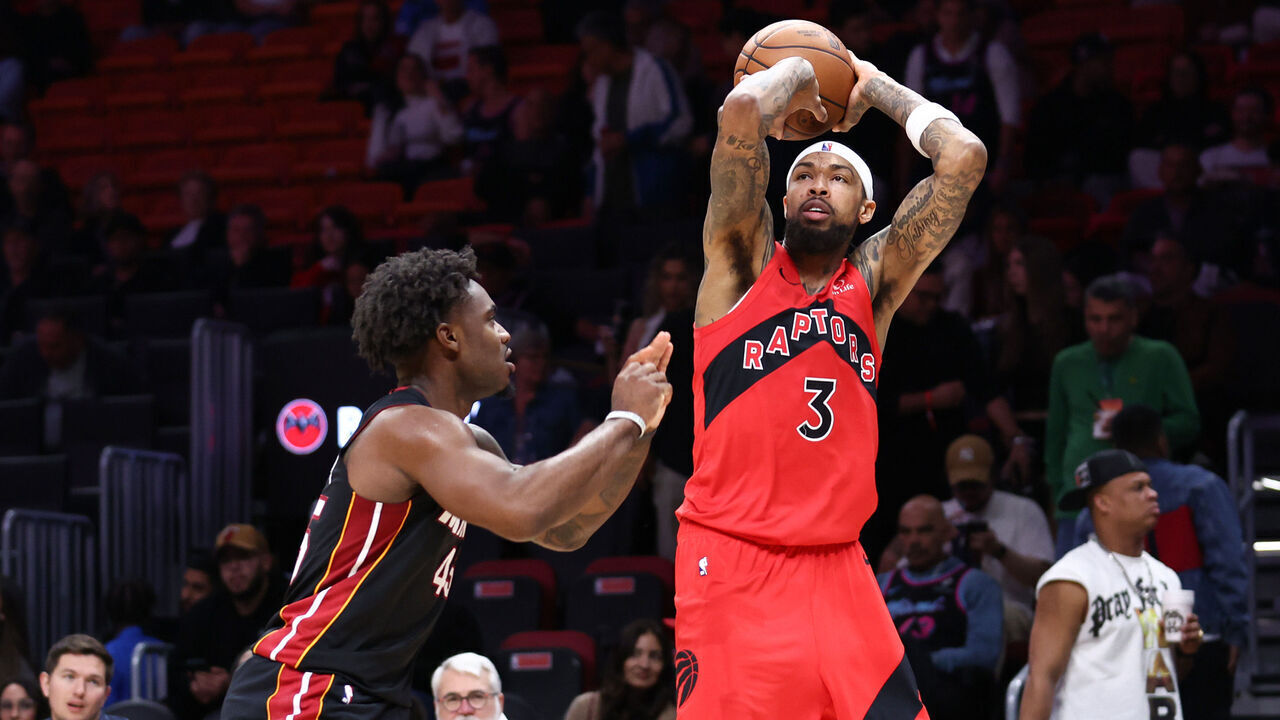 MIAMI, FLORIDA - DECEMBER 15: Brandon Ingram #3 of the Toronto Raptors shoots the ball over Davion Mitchell #45 of the Miami Heat during the fourth quarter of the game at Kaseya Center on December 15, 2025 in Miami, Florida.