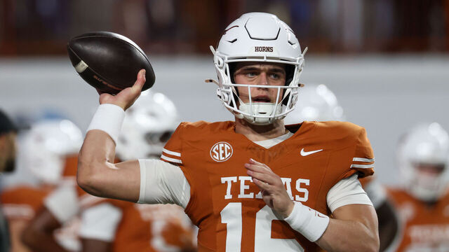 AUSTIN, TX - NOVEMBER 28: Quarterback Arch Manning #16 of the Texas Longhorns warms up before the SEC football game between Texas Longhorns and Texas A&M Aggies on November 28, 2025, at Darrell K Royal-Texas Memorial Stadium in Austin, TX.