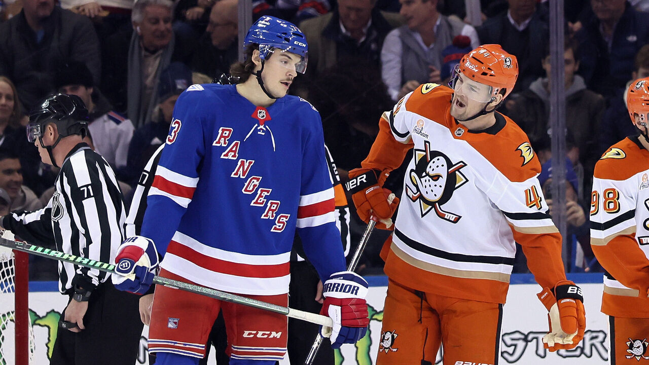 NEW YORK, NEW YORK - DECEMBER 15: Ross Johnston #44 of the Anaheim Ducks hats with Matt Rempe #73 of the New York Rangers during the first period at Madison Square Garden on December 15, 2025 in New York City.