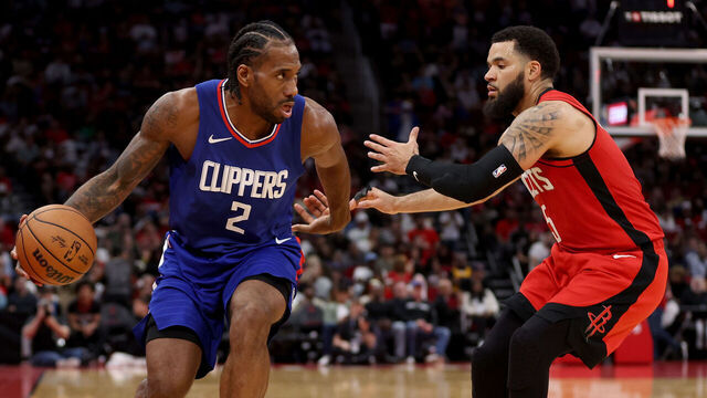 HOUSTON, TEXAS - MARCH 06: Kawhi Leonard #2 of the Los Angeles Clippers dribbles the ball while defended by Fred VanVleet #5 of the Houston Rockets in the second half at Toyota Center on March 06, 2024 in Houston, Texas.