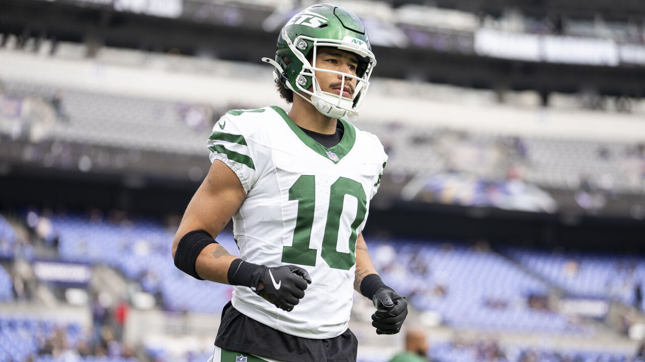 BALTIMORE, MARYLAND - NOVEMBER 23: Allen Lazard #10 of the New York Jets runs prior to an NFL football game against the Baltimore Ravens at M&T Bank Stadium on November 23, 2025 in Baltimore, Maryland.
