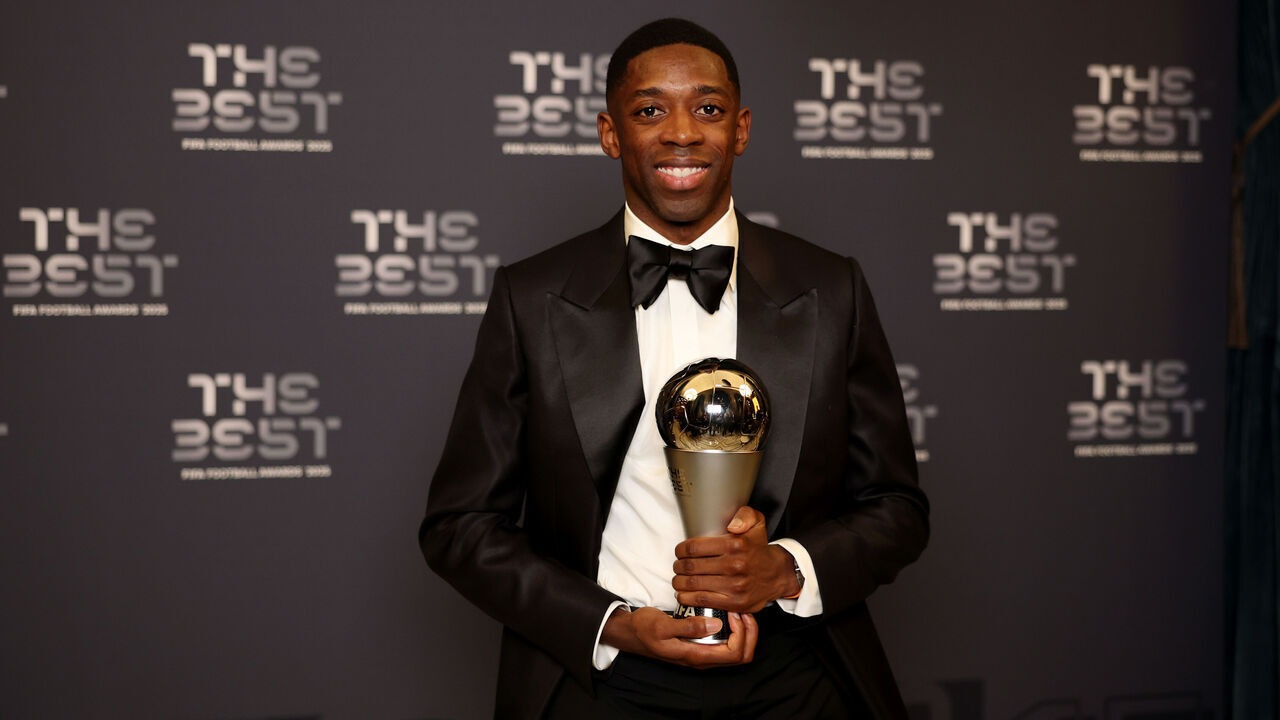 DOHA, QATAR - DECEMBER 16: The Best Fifa Men's Player winner, Ousmane Dembele, poses for a photo with the trophy during The Best FIFA Football Awards 2025 at the Fairmont Katara Hall on December 16, 2025 in Doha, Qatar.