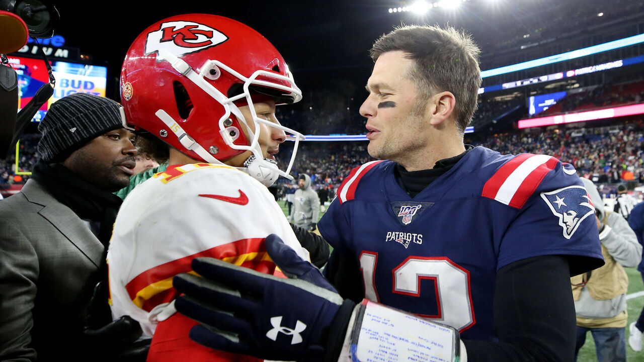 FOXBOROUGH, MASSACHUSETTS - DECEMBER 08: Tom Brady #12 of the New England Patriots talks with Patrick Mahomes #15 of the Kansas City Chiefs after the Chief defeat the Patriots 23-16 at Gillette Stadium on December 08, 2019 in Foxborough, Massachusetts.