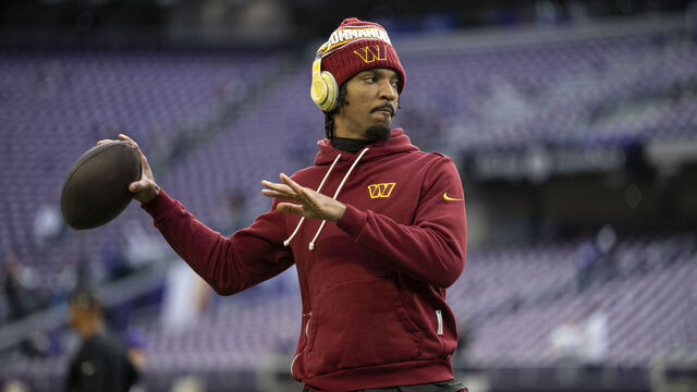 MINNEAPOLIS, MINNESOTA - DECEMBER 7: Jayden Daniels #5 of the Washington Commanders looks to pass during an NFL football game against the Minnesota Vikings at U.S. Bank Stadium on December 07, 2025 in Minneapolis, Minnesota.