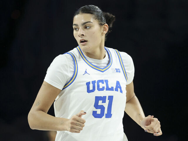 LAS VEGAS, NEVADA - NOVEMBER 15: Lauren Betts #51 of the UCLA Bruins jogs down court after a basket against the South Florida Bulls in the third quarter of a 2025 WBCA Challenge game at Michelob ULTRA Arena on November 15, 2025 in Las Vegas, Nevada.