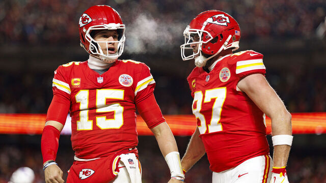 KANSAS CITY, MISSOURI - JANUARY 26: Quarterback Patrick Mahomes #15 of the Kansas City Chiefs celebrates with tight end Travis Kelce #87 after a touchdown during the second half of the AFC Championship football game against the Buffalo Bills, at GEHA Field at Arrowhead Stadium on January 26, 2025 in Kansas City, Missouri.
