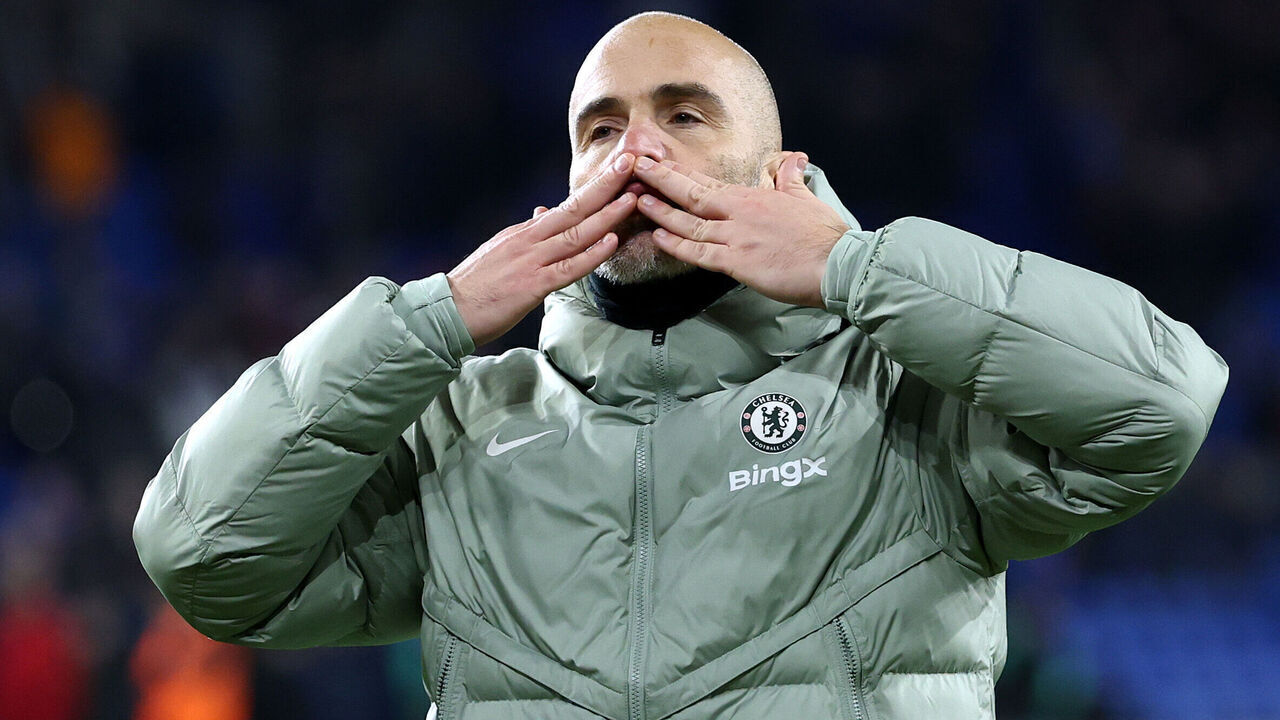 CARDIFF, WALES - DECEMBER 16: Enzo Maresca, Manager of Chelsea, shows his appreciation to the fans following the team's victory in the Carabao Cup Quarter Final match between Cardiff City and Chelsea at Cardiff City Stadium on December 16, 2025 in Cardiff, Wales.