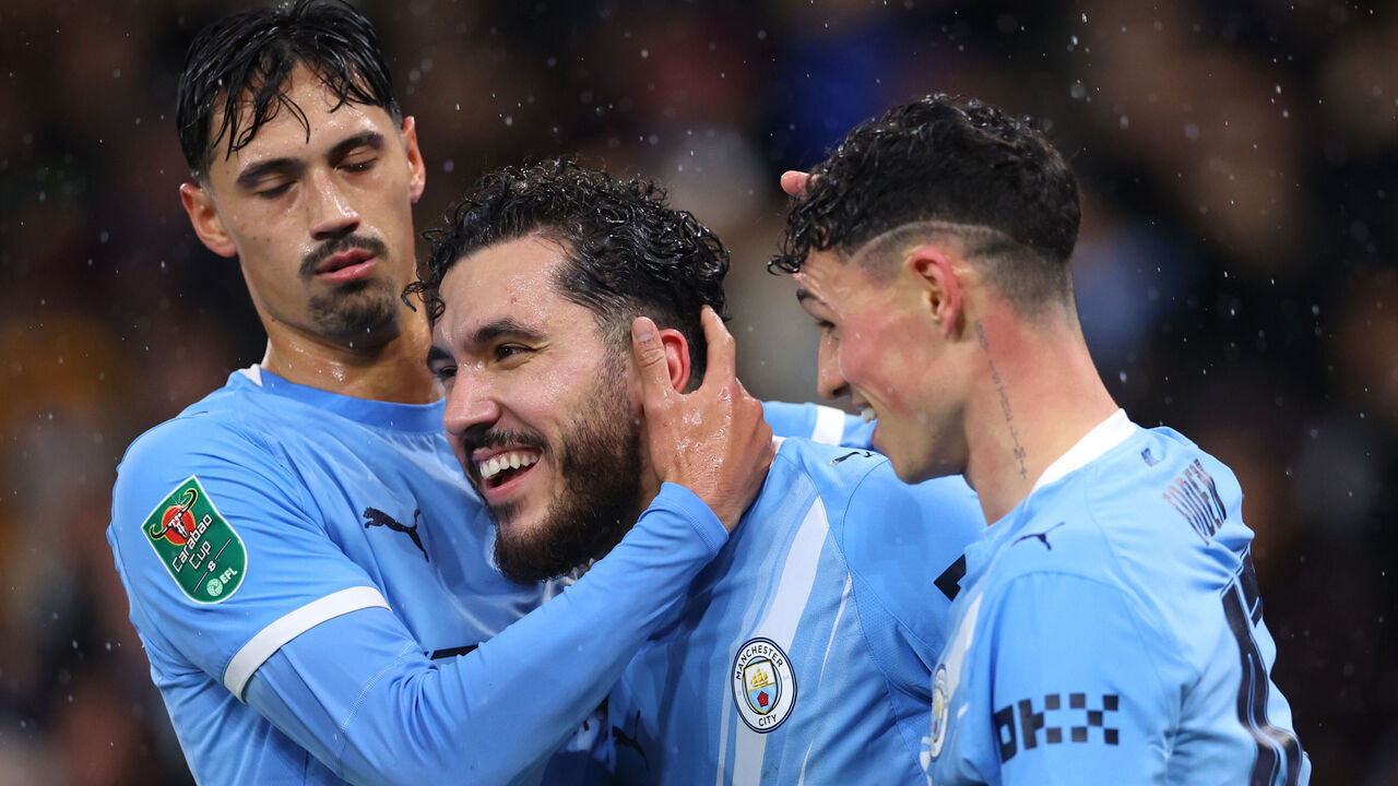 MANCHESTER, ENGLAND - DECEMBER 17: Rayan Cherki of Manchester City celebrates scoring his team's first goal with team mates during the Carabao Cup Quarter Final match between Manchester City and Brentford at Etihad Stadium on December 17, 2025 in Manchester, England.