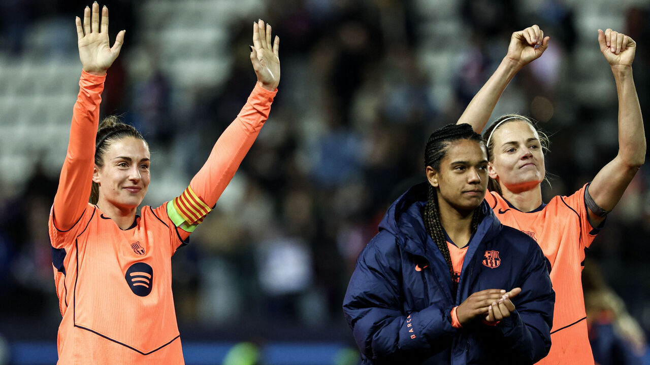 Barcelona's Spanish midfielder #11 Alexia Putellas (L), Barcelona's Dutch midfielder #24 Esmee Brugts (C) and Barcelona's Spanish defender #02 Irene Paredes celebrate following the victory at the end of the UEFA Women's Champions League group-stage football match between Paris FC and FC Barcelona at the Stade Jean-Bouin, in Paris, on december 17, 2025.