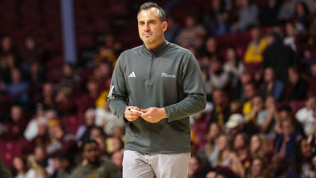 MINNEAPOLIS, MINNESOTA - NOVEMBER 15: Head Coach Doug Gottlieb of the Green Bay Phoenix looks on during the second half at Williams Arena on November 15, 2025 in Minneapolis, Minnesota.