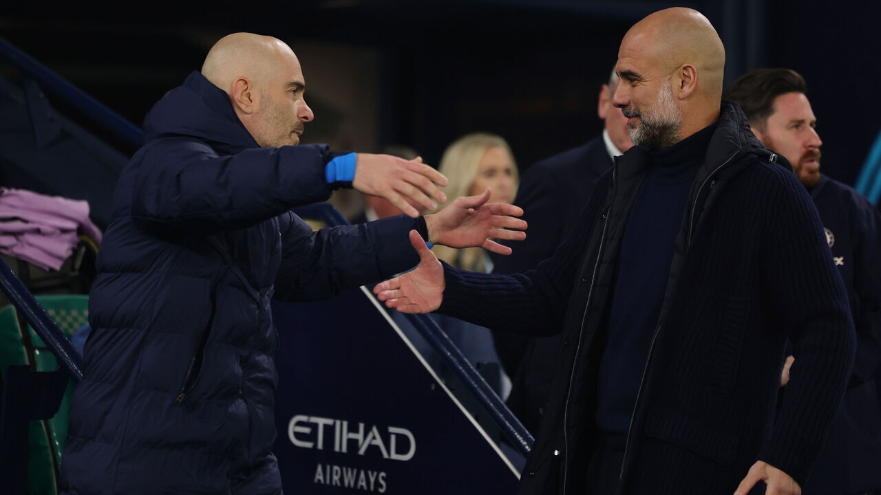 MANCHESTER, ENGLAND - JANUARY 25:Manchester City Manager Pep Guardiola with Chelsea Manager Enzo Maresca during the Premier League match between Manchester City FC and Chelsea FC at Etihad Stadium on January 25, 2025 in Manchester, England.