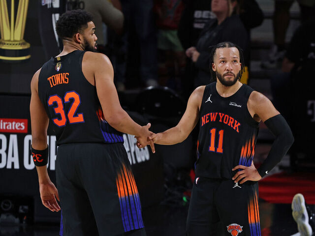 NEW YORK, NY - DECEMBER 16: Karl-Anthony Towns #32 and Jalen Brunson #11 of the New York Knicks high five during the game against the San Antonio Spurs during the NBA Emirates Cup Final on December 16, 2025 at T-Mobile Arena in Las Vegas, Nevada Mandatory Copyright Notice: Copyright 2025 NBAE