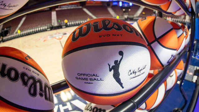 UNCASVILLE, CT - SEPTEMBER 10: A detail view of the WNBA logo on a WNBA official game ball on a rack before a WNBA game between the Atlanta Dream and the Connecticut Sun on September 10, 2025, at Mohegan Sun Arena in Uncasville, CT.