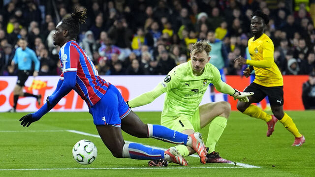Crystal Palace's Christantus Uche reacts to a challenge from KuPS goalkeeper Johannes Kreidl during the UEFA Conference League match at Selhurst Park, London. Picture date: Thursday December 18, 2025.