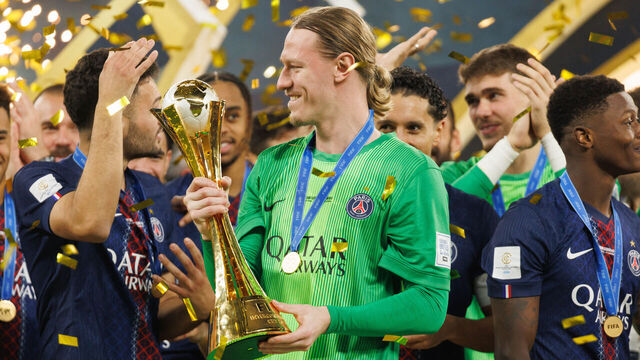Doha, Qatar - December 17: Matvei Safonov of Paris Saint-Germain lifts the Intercontinental Cup trophy after Paris Saint-Germain win the FIFA Intercontinental Cup 2025 final match between Paris Saint-Germain and CR Flamengo at Ahmad Bin Ali Stadium on December 17, 2025 in Doha, Qatar.