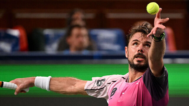 Switzerland's Stan Wawrinka serves to Hungary's Fabian Marozsan in their men's singles match at the Shanghai Masters tennis tournament in Shanghai on October 1, 2025.