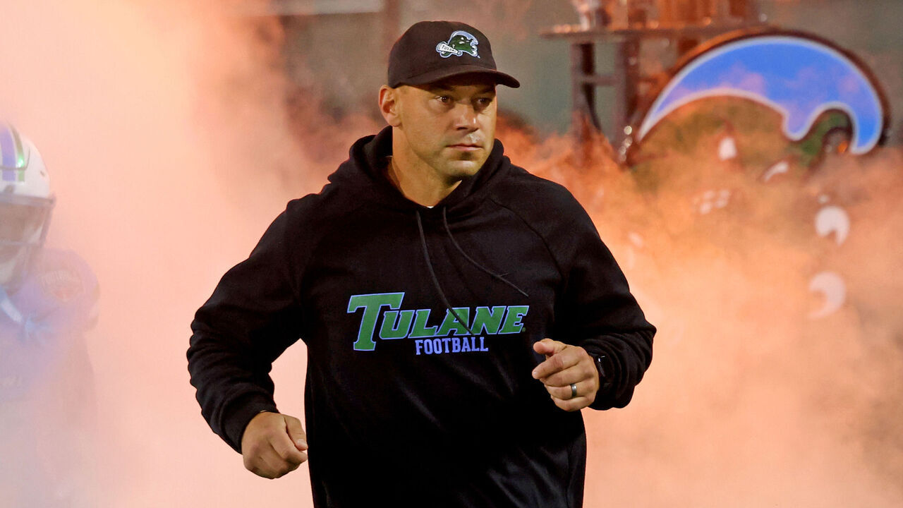 NEW ORLEANS, LOUISIANA - DECEMBER 5: Head coach Jon Sumrall of the Tulane Green Wave leads the team out for the game against the North Texas Mean Green during the 2025 American Conference Football Championship at Yulman Stadium on December 5, 2025 in New Orleans, Louisiana.