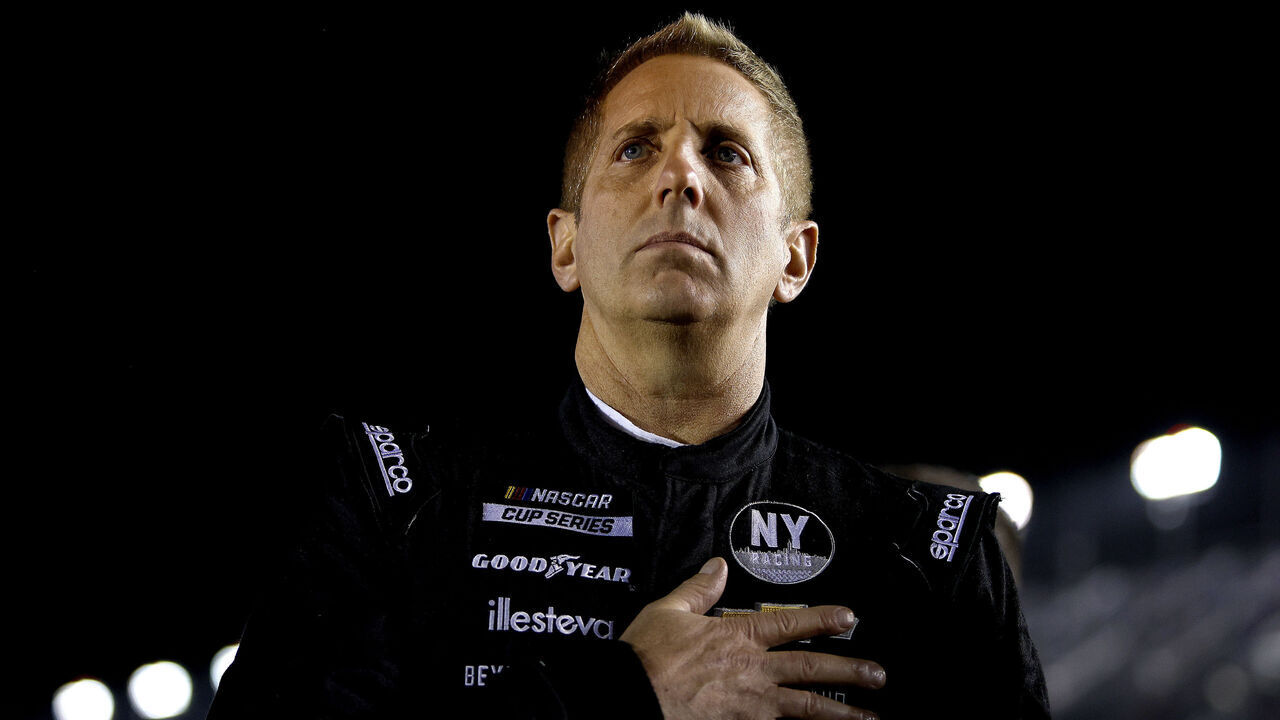 DAYTONA BEACH, FLORIDA - FEBRUARY 16: Greg Biffle, driver of the #44 Grambling State University Chevrolet, stands on the grid during qualifying for the NASCAR Cup Series 64th Annual Daytona 500 at Daytona International Speedway on February 16, 2022 in Daytona Beach, Florida.