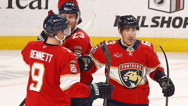 SUNRISE, FLORIDA - DECEMBER 19: Brad Marchand #63 of the Florida Panthers celebrates his goal with teammates during the third period against the Carolina Hurricanes at the Amerant Bank Arena on December 19, 2025 in Sunrise, Florida.