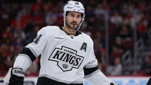 CHICAGO, IL - OCTOBER 26: Phillip Danault #24 of the Los Angeles Kings looks on during the second period against the Chicago Blackhawks on October 26, 2025 at the Untied Center in Chicago, Illinois.