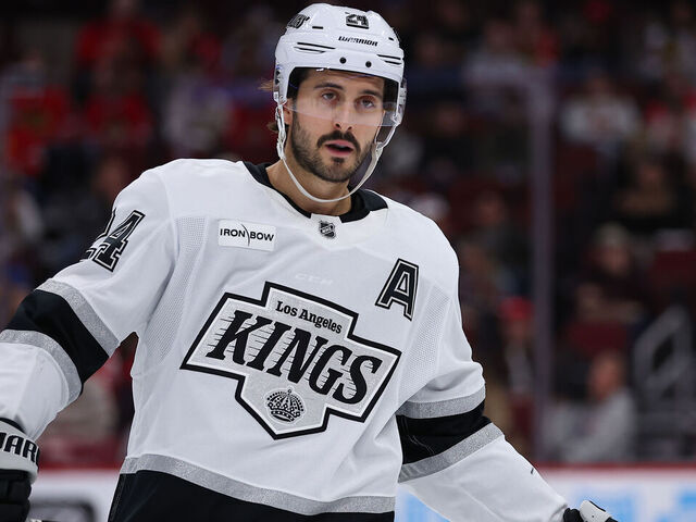 CHICAGO, IL - OCTOBER 26: Phillip Danault #24 of the Los Angeles Kings looks on during the second period against the Chicago Blackhawks on October 26, 2025 at the Untied Center in Chicago, Illinois.
