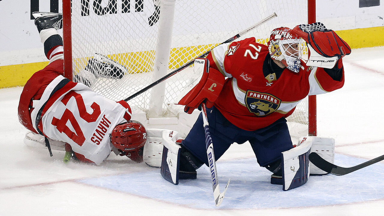SUNRISE, FLORIDA - DECEMBER 19: Goaltender Sergei Bobrovsky #72 of the Florida Panthers defends the net against Seth Jarvis #24 of the Carolina Hurricanes at the Amerant Bank Arena on December 19, 2025 in Sunrise, Florida.