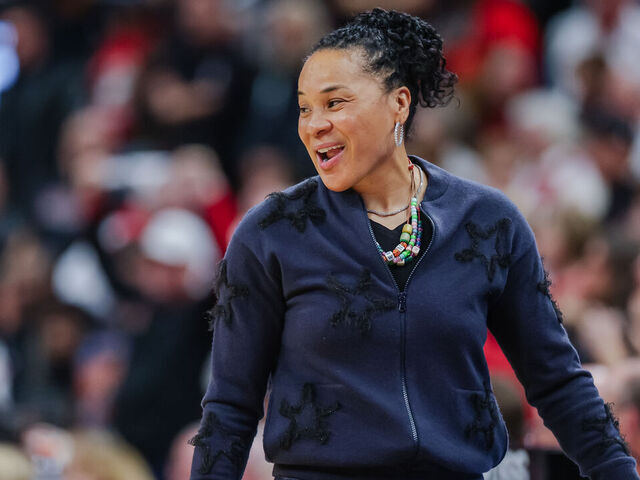 LOUISVILLE, KENTUCKY - DECEMBER 4: Head coach Dawn Staley of the South Carolina Gamecocks coaches along the sidelines during the game against the Louisville Cardinals at KFC YUM! Center on December 4, 2025 in Louisville, Kentucky.