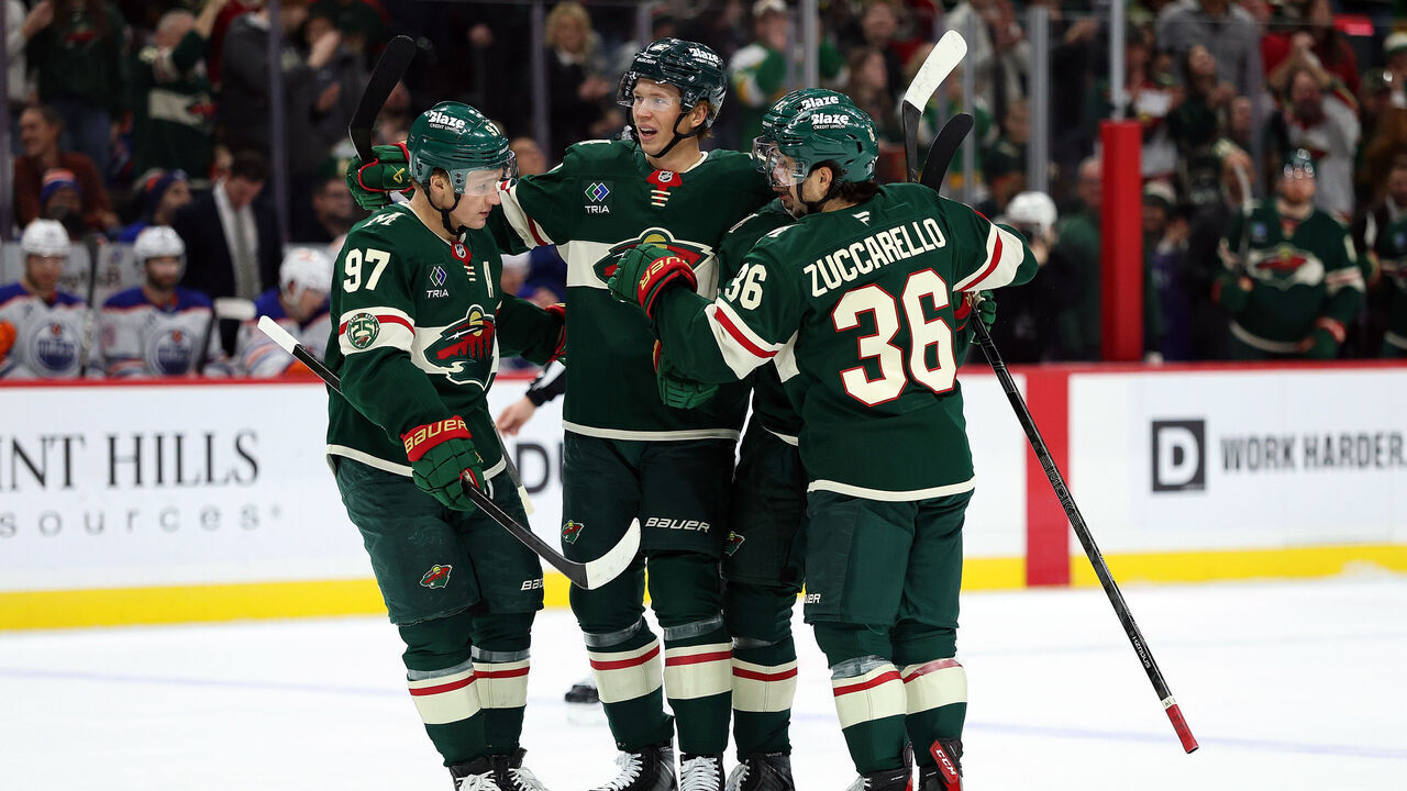 ST PAUL, MINNESOTA - DECEMBER 20: Matt Boldy #12 of the Minnesota Wild (C) celebrates his power-play goal against the Edmonton Oilers with teammates for his second of the game in the first period at Grand Casino Arena on December 20, 2025 in St Paul, Minnesota.